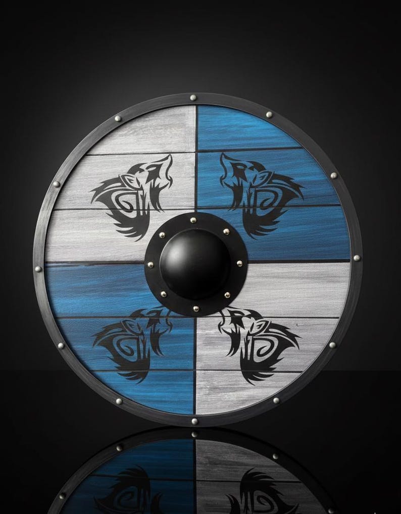 Handmade Viking Wooden Shield with reinforced metal rim, leather grip, and traditional Norse warrior craftsmanship for historical display