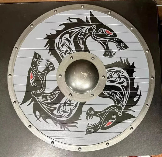 Front view of handmade Viking wooden shield with heavy metal fittings
