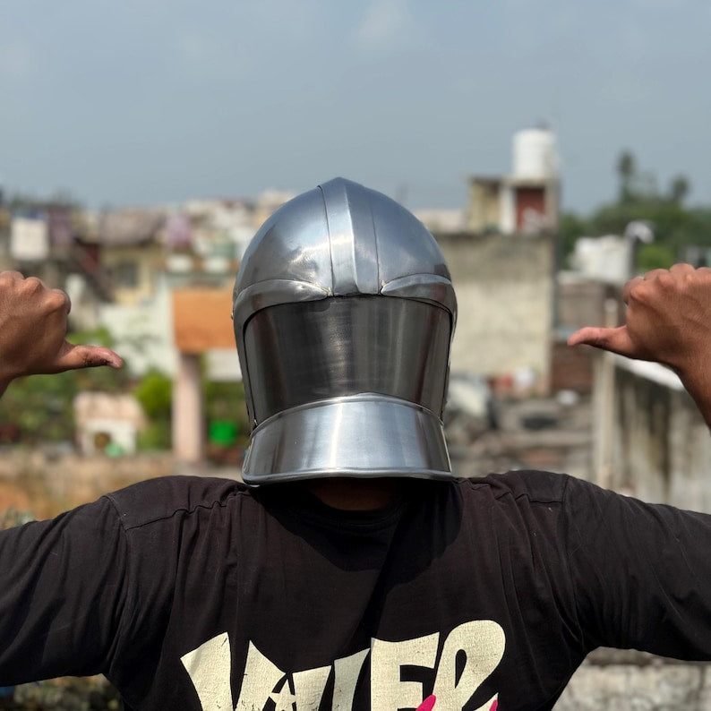 Collector’s display of Visor of Aegis Prime medieval knight helmet with golden accents and historical authenticity